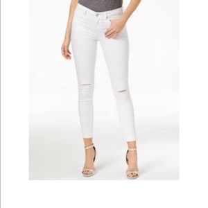 White ripped at the knee white jeans